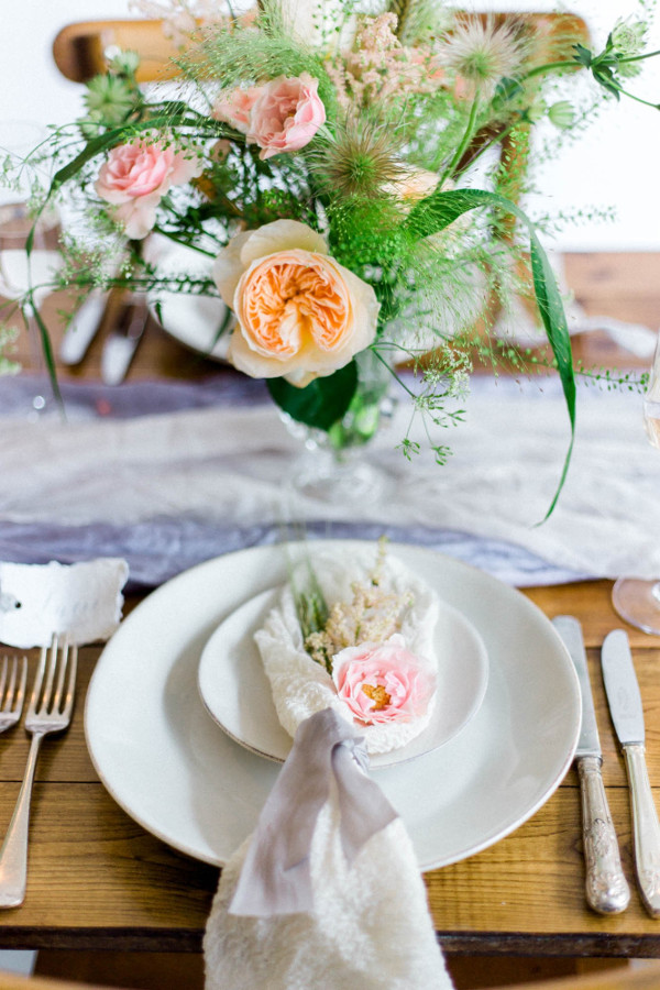 blush table setting with lilac runner