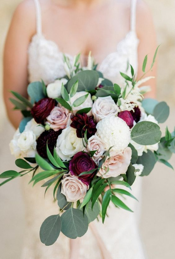 unstructured wedding bouquet with pale pink roses, orchids and lily of the valley